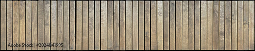 Konstfotografi A panoramic texture of vertical wooden slats with a pronounced natural wood grain