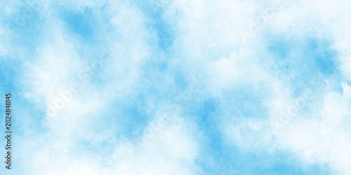 Photos Creative design with grunge aquarelle paper textured canvas for vintage design, blue sky background with white clouds