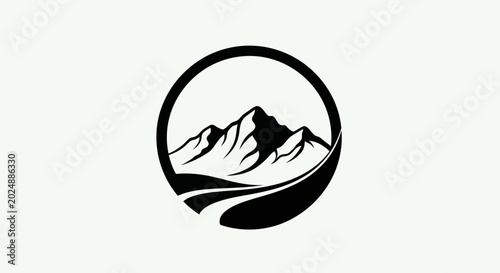 Mountain range silhouette in a circular frame