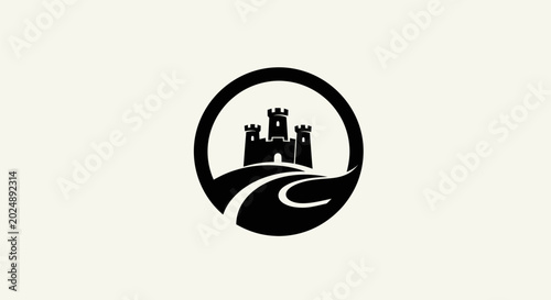 Fotografie Castle silhouette in a circular emblem