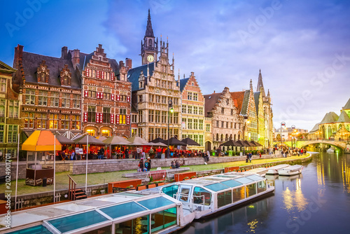 Fotografi View of buildings with tourboats moored, Ghent, Belgium
