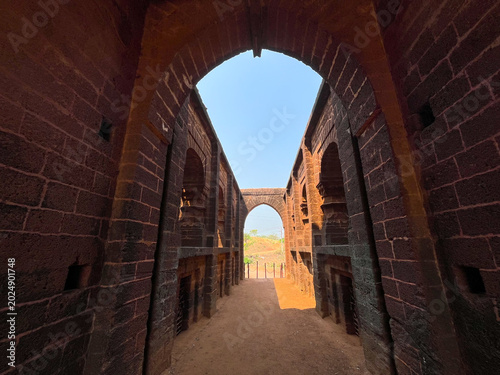 In Bishnupur, this arched entrance—crafted from Makra stone—is known as the 'Pathar Darja' (Stone Gate). Actually, this was an entrance.
