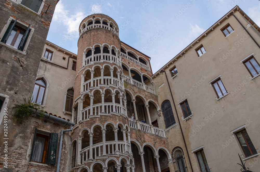 Fototapeta premium Italy, Venice, September 30, 2025, Scala Contarini del Bovolo is one of the most charming and somewhat hidden attractions of Venice,