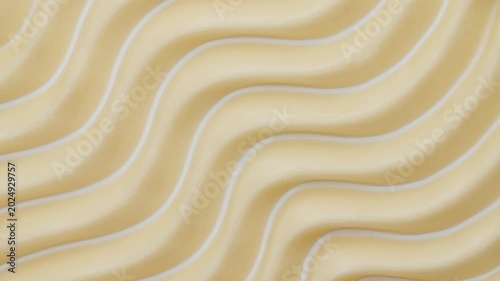 Yellow skincare cosmetic cream texture footage. Moisturising waves cream texture motion with spatula. Body care light creamy beauty product smudge closeup. Sample for advertising cosmetic products. 4k