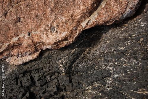 Принти на полотні The texture of two-colored stone diagonally across the frame