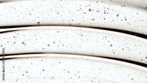 Transparent Gel, Serum, Oi Cosmetic With Molecule Bubbles As It Slowly Slides Down. - Macro Shot. Abstract Background for Cosmetics Commercial Product. High quality 4k footage