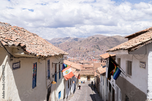 Bild auf Leinwand Peruvian Historic Town Street with Mountains