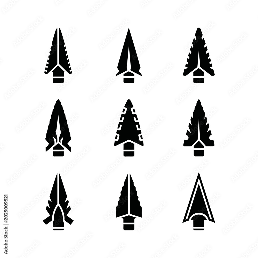 Obraz premium Collection of nine black arrowheads on a white background.