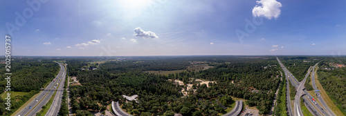 Aerial 360 degrees panorama of A28 freeway in Dutch moorland sand landscape of Leusden near Amersfoort. Traffic and artery interstate seen from above. Ready for VR