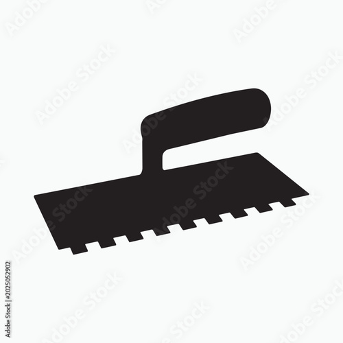 Obraz na plátně Black notched trowel silhouette on white background construction tool building t
