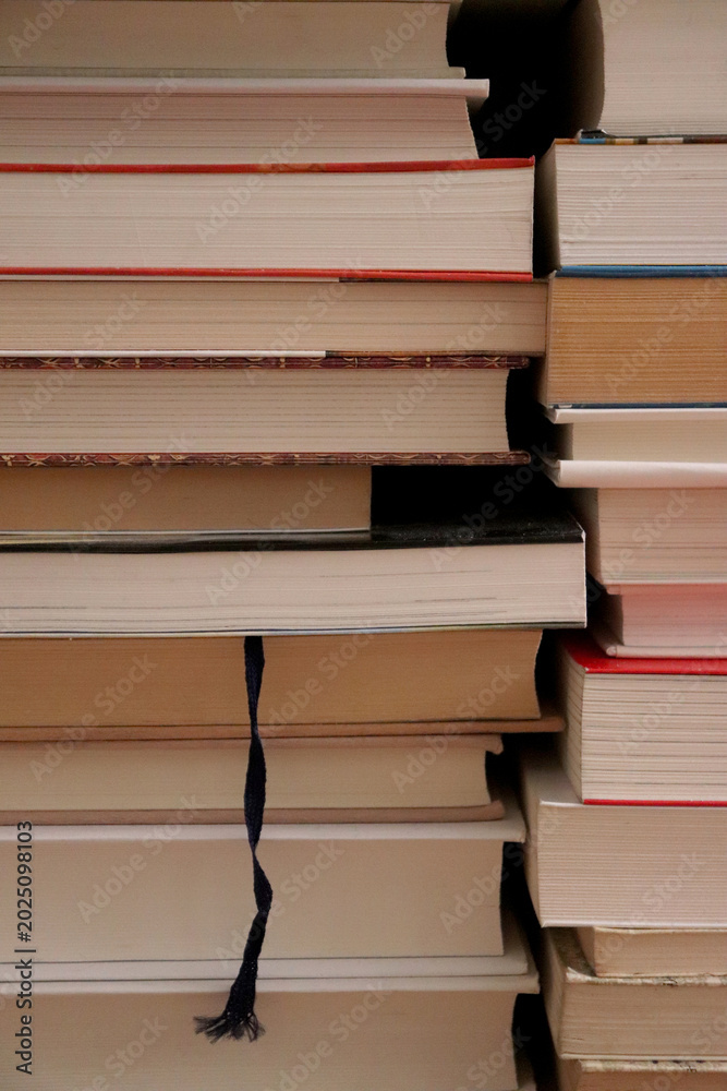Fototapeta premium Pile of Hardcover Books with Page Texture and Study Concept