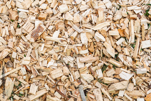 Canvas Print Close-up full frame view of a pile of wood chips, commonly used for landscaping, mulch, or biomass fuel