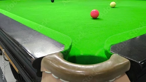 Close up of Snooker shooting on snooker table in slow motion.