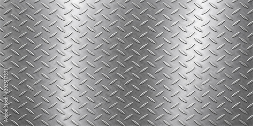 Close-up view of textured diamond plate steel surface with raised pattern and metallic finish, perfect for industrial design