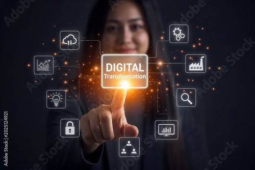 Woman is interacting with virtual icons highlighting digital transformation concepts in a modern setting.