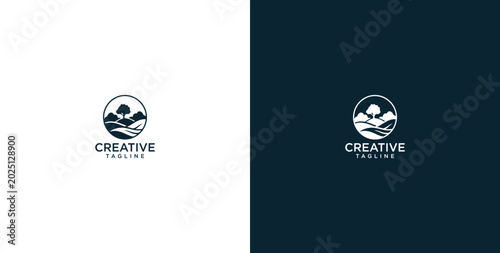 Foto An elegantly designed circular logo featuring a harmonious natural landscape wit