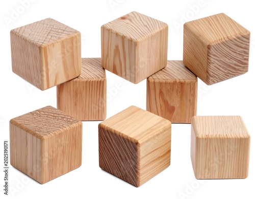 Natural Wooden Toy Cubes Arranged in Loose Stack on White Background