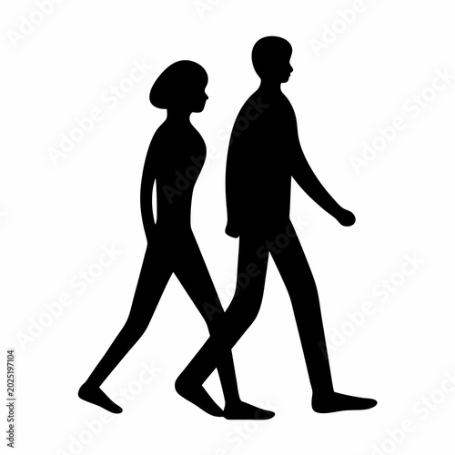 Silhouettes of a man and a woman walking side by side together