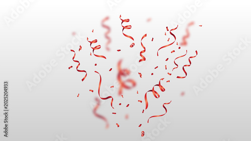bursting red confetti and ribbon