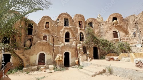 Fortified village with houses and granaries, sights of Tunisia. Ksar of Medenine, Berber, Tataouine. Uncomplicated and simple village architecture of ancient Muslim tribes, Tunisian Berbers