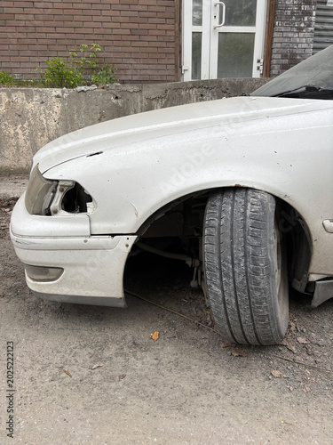 A car wheel turned to the side. The concept of technical problems of the car chassis.