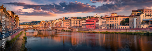 Canvastavla Panoramic evening view of medieval arched Ponte alla Carraia bridge over Arno river