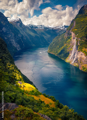 Valokuva Vertical summer view of Sunnylvsfjorden fjord, Geiranger village location, western Norway, Europe