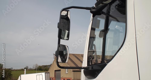 Side wing mirrors on modern truck improve rear visibilty road safety