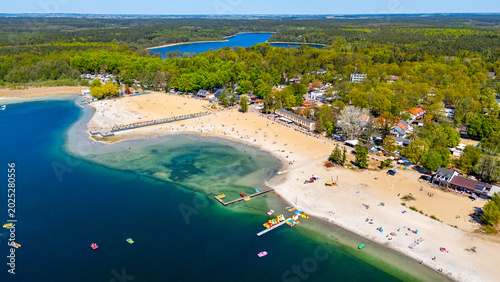 Εκτύπωση καμβά Wide aerial drone view of the holiday resort in Skorzecin, featuring a large san
