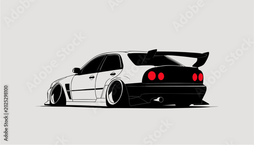 Schilderij op canvas White stanced sports car with a large spoiler and prominent red taillights