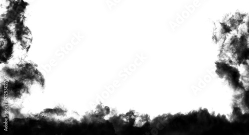 Foto Dense black smoke rising in an intense cloud formation captured in this high contrast photograph showing dark billowing fumes that swirl and expand upwards against a clean and bright space