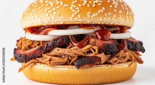A gourmet burger with crispy fried onions, juicy beef patty, bacon strips, and fresh tomato and onion slices. Perfect for restaurant menus, food photography, or advertising dining experiences.