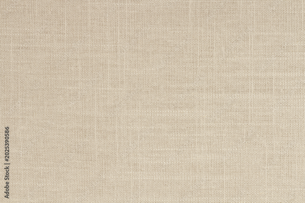 Fototapeta premium Brown linen fabric cloth texture for background, natural textile pattern.