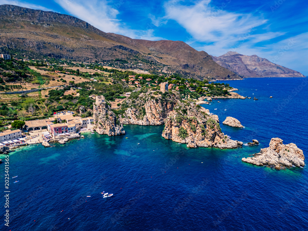 Obraz premium Beauty of the nature of the Sicilian coasts. Bay of Scopello and its stacks. View from above.