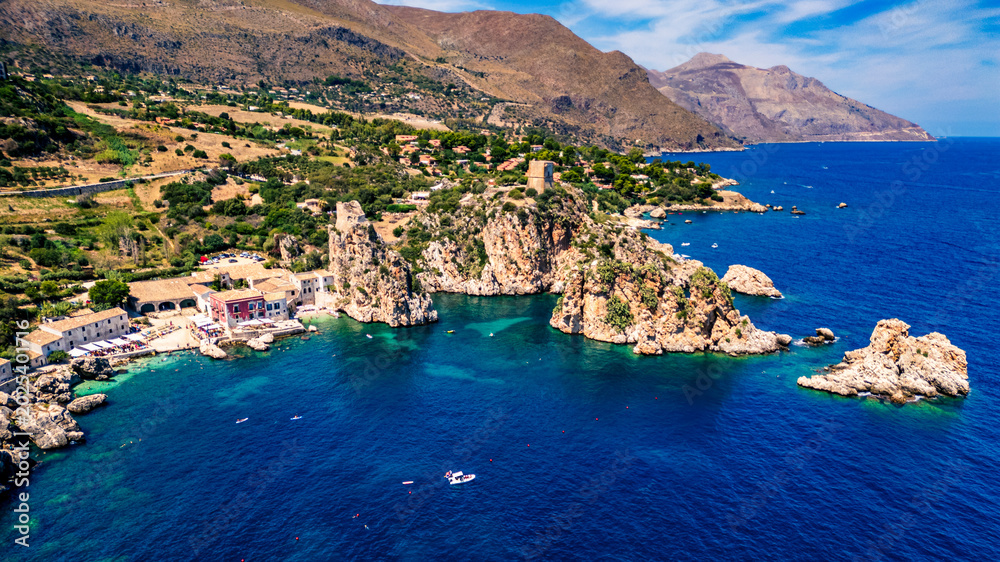 Obraz premium Beauty of the nature of the Sicilian coasts. Bay of Scopello and its stacks. View from above.