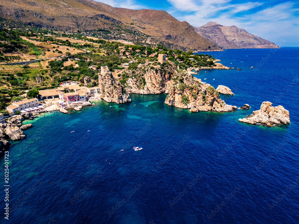 Obraz premium Beauty of the nature of the Sicilian coasts. Bay of Scopello and its stacks. View from above.