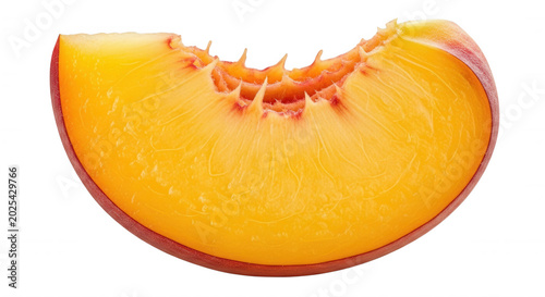 A single, juicy slice of fresh peach fruit with vibrant orange and yellow flesh, isolated against a solid black background