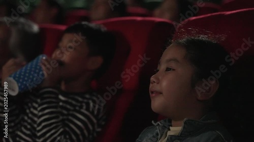 People go to watch movie at cinema complex during weekend. Lifestyle, weekend activity.