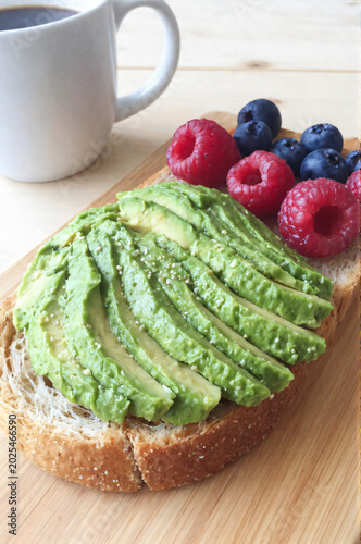An Avocado Toast with Berries and Raspberries