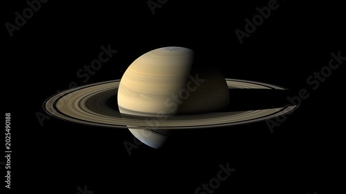 Planet Saturn with iconic rings isolated on black background in deep space