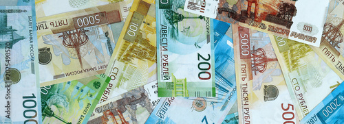 Foto Russian ruble money banknotes pile on table