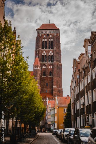 St. Mary’s Basilica Tower in Gdańsk Old Town Street View. Poland. 