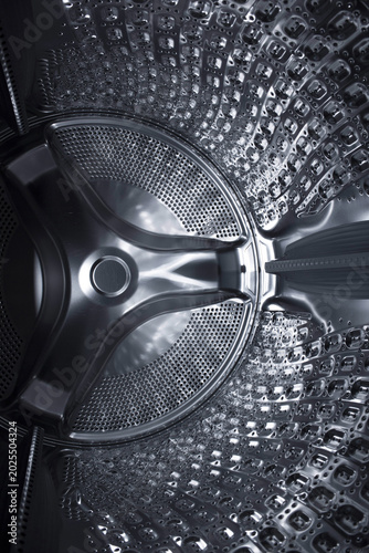 Inside of the washing machine drum .