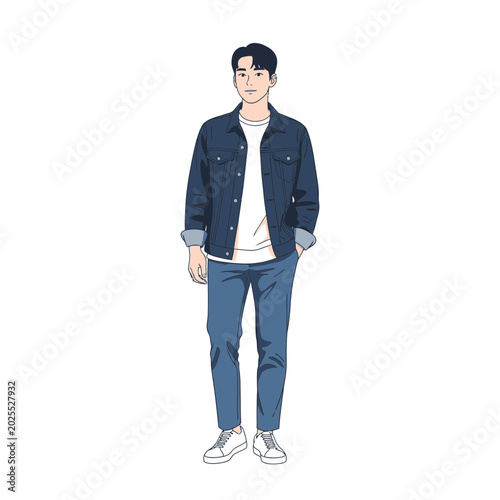 Young Man Standing Confidently in Casual Denim Outfit.