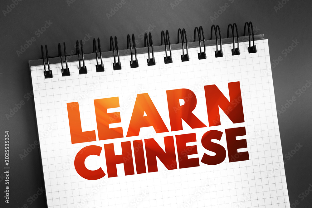 Fototapeta premium Learn Chinese text quote on notepad, concept background