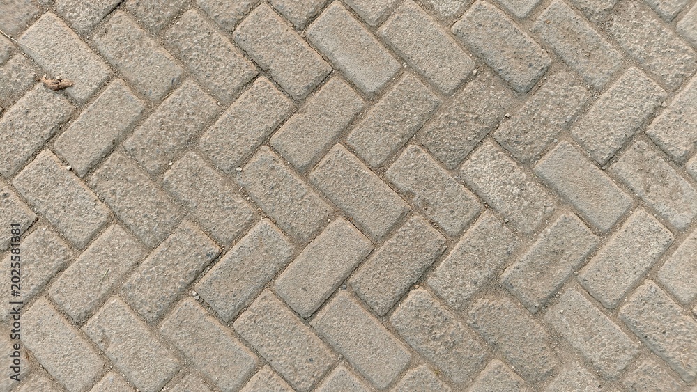 Fototapeta premium Full Frame Interlocking Paving Block Pattern Texture for Urban Flooring and Architectural Background Design