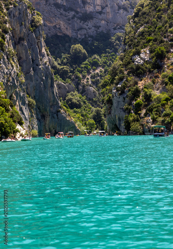  Tourists explore the Verdon Gorge in pedal boats, kayaks and paddle boats. An ideal place for an active holiday in Provence-Alpes-Côte d'Azur, France.