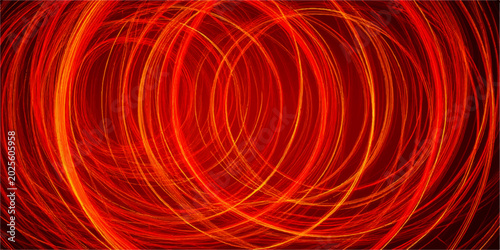 Tableau sur toile Abstract fiery red and orange concentric circles create a dynamic and energetic background pattern, suggesting motion and heat