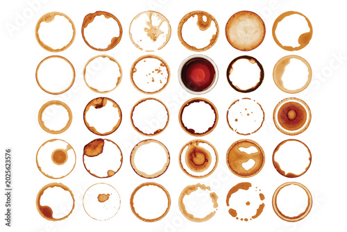 Collection of coffee ring stains on a white background overhead view