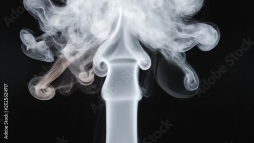 Abstract Smoke Rising Upwards on Black Background: White Vapor Forming Shapes